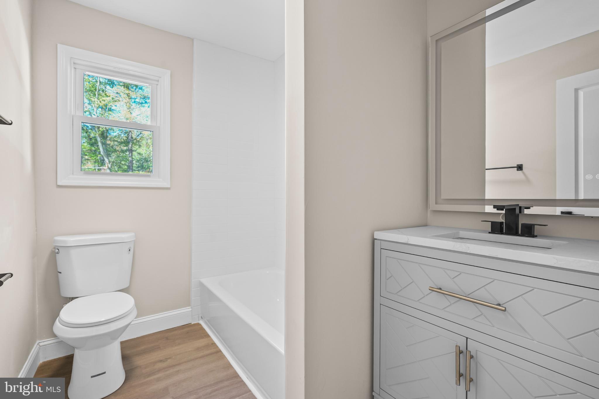 393 East Millstream Road Cream Ridge, NJ 08514 - Photo 13 of 29 a bathroom with a sink toilet and a mirror