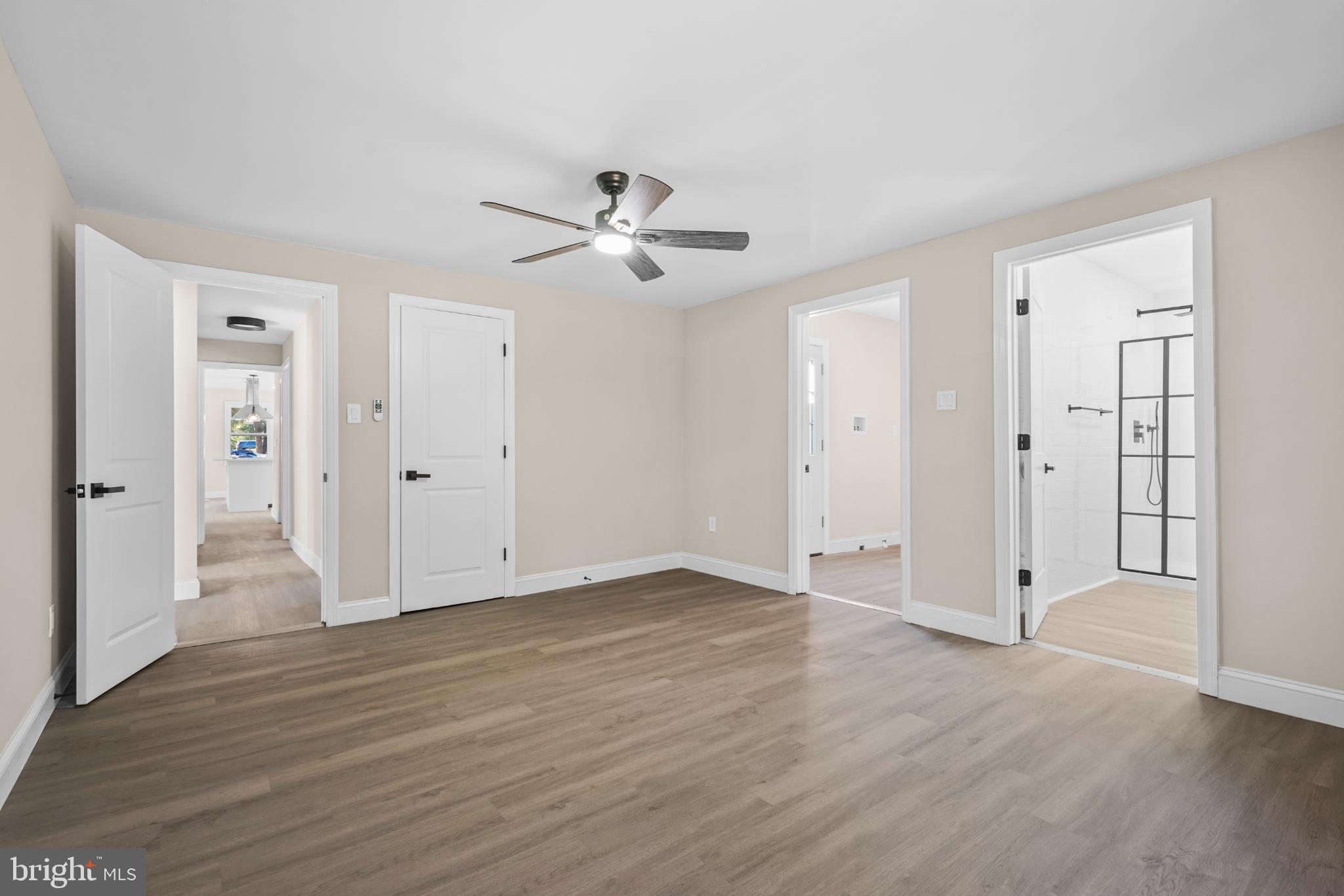 393 East Millstream Road Cream Ridge, NJ 08514 - Photo 17 of 29 a view of empty room with wooden floor and ceiling fan