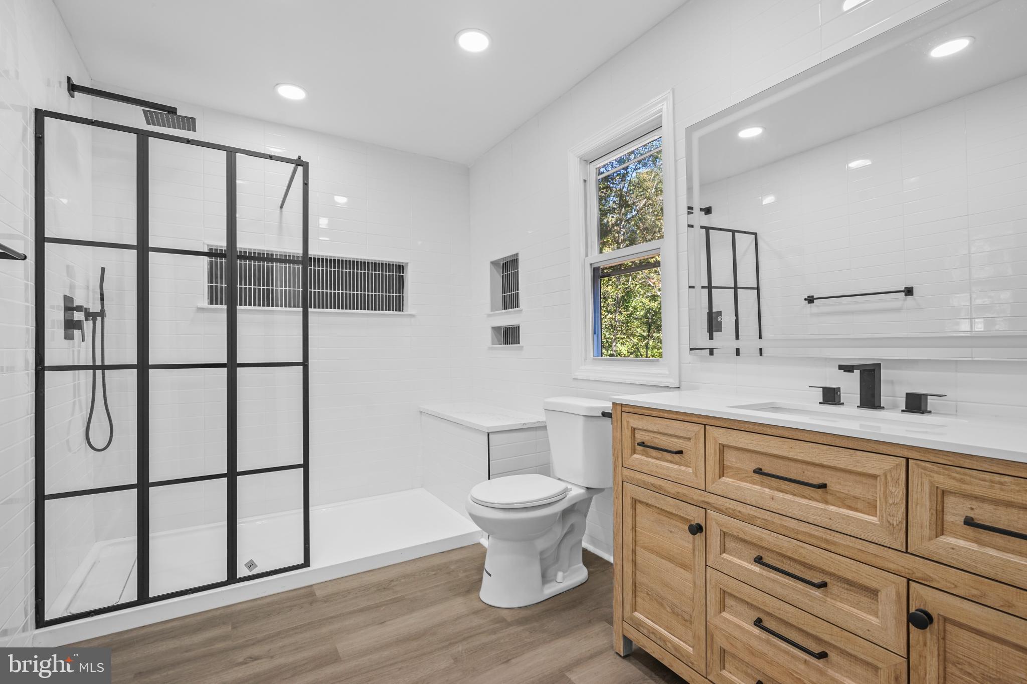 393 East Millstream Road Cream Ridge, NJ 08514 - Photo 20 of 29 a bathroom with a toilet sink and mirror