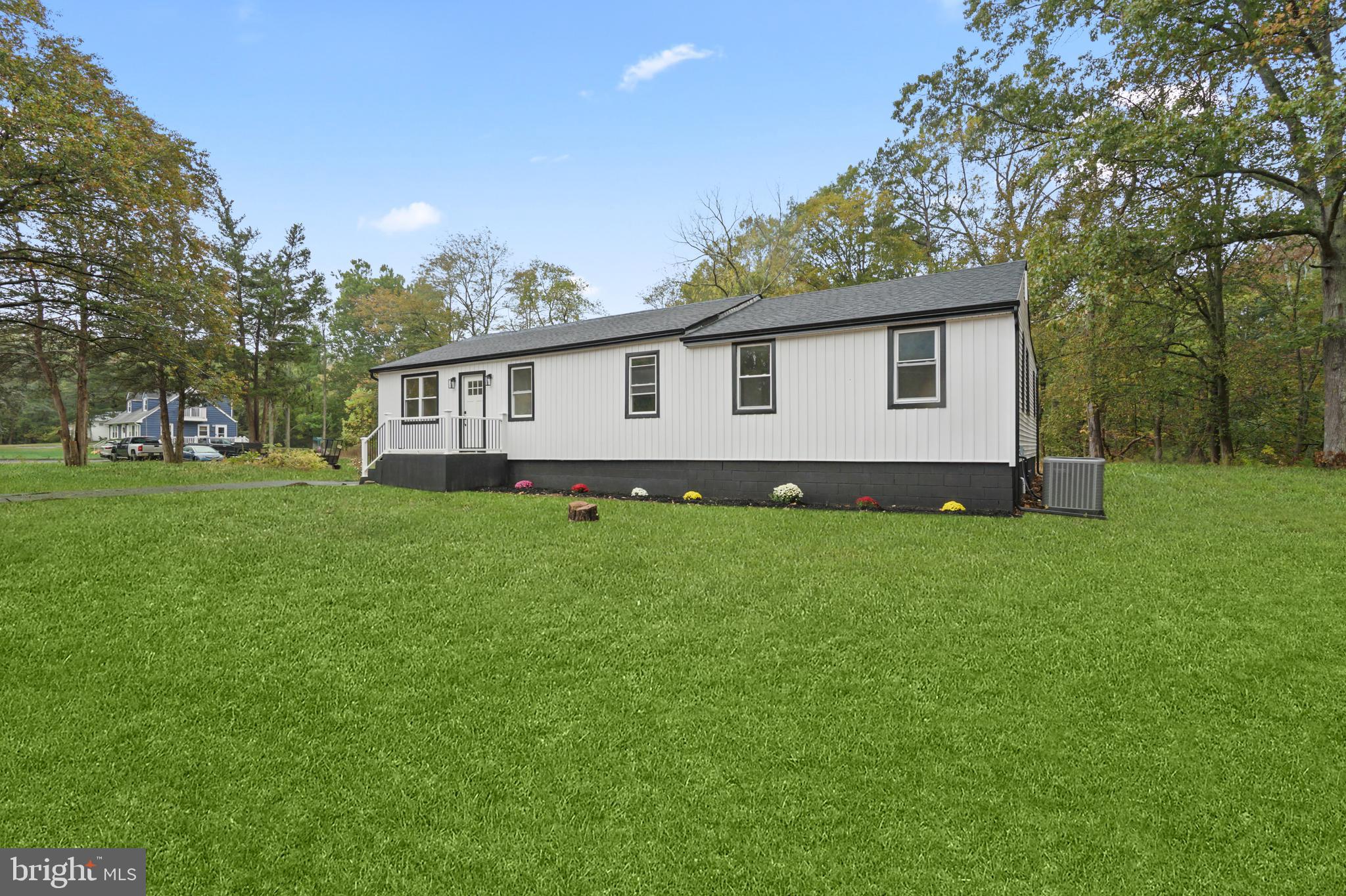 393 East Millstream Road Cream Ridge, NJ 08514 - Photo 24 of 29 a view of a house with a backyard