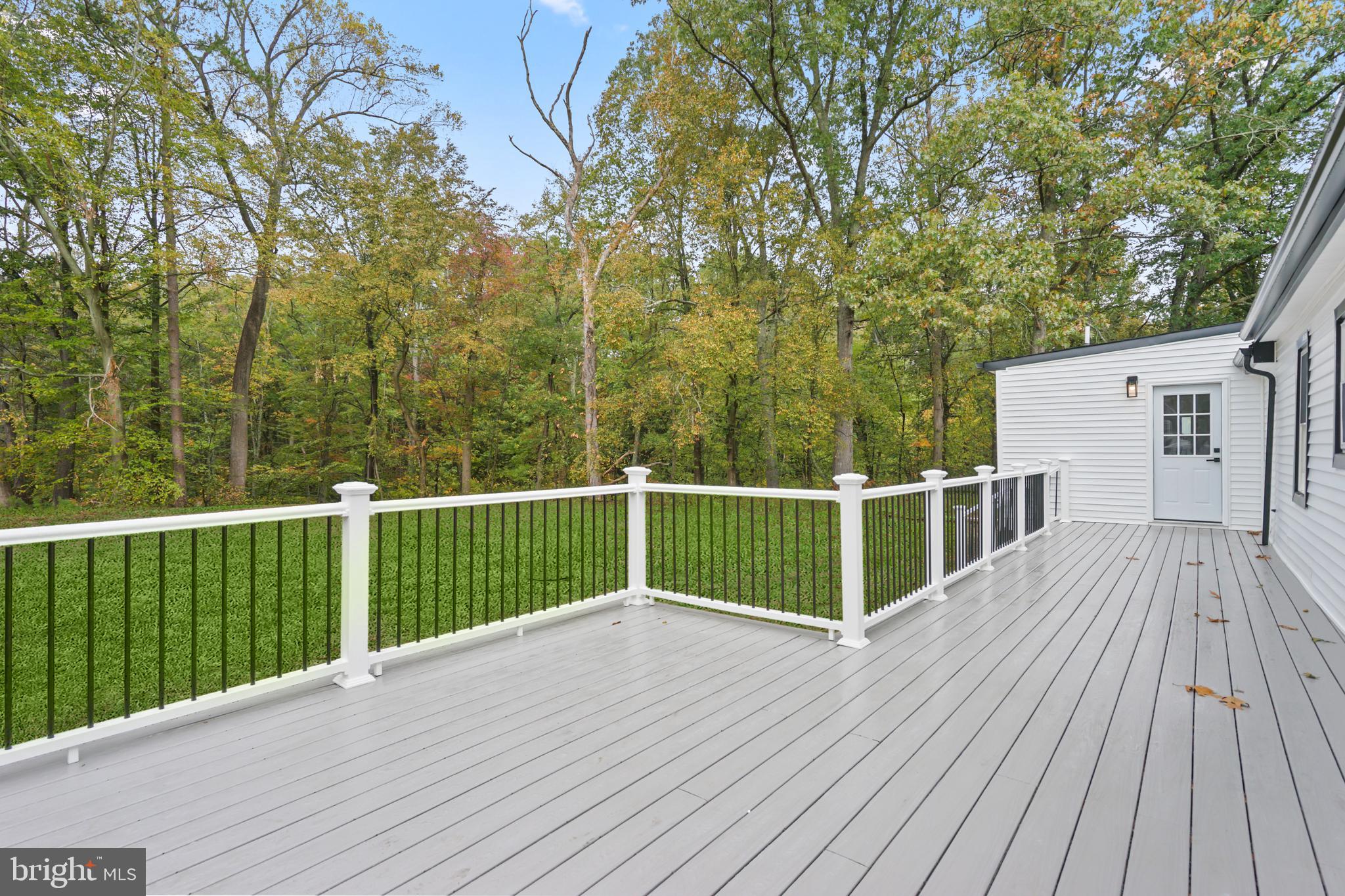 393 East Millstream Road Cream Ridge, NJ 08514 - Photo 26 of 29 a view of a wooden deck