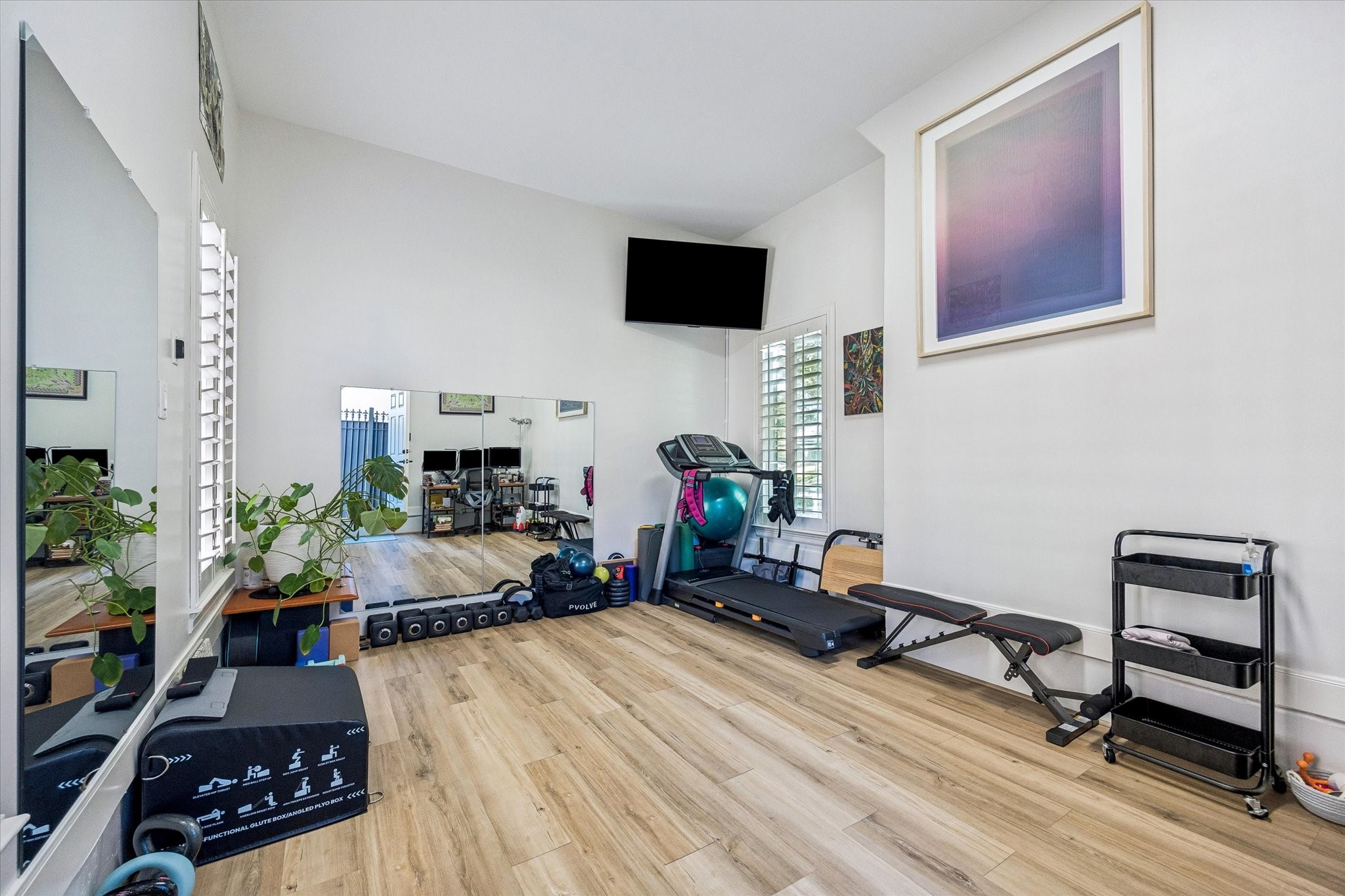 3047 Bonnebridge Way Boulevard Houston, TX 77082 - Photo 9 of 50 This bright and spacious flex room features beautiful wood flooring and an abundance of natural light. It is a versatile space perfect for a second private home office, gym, or hobby room.