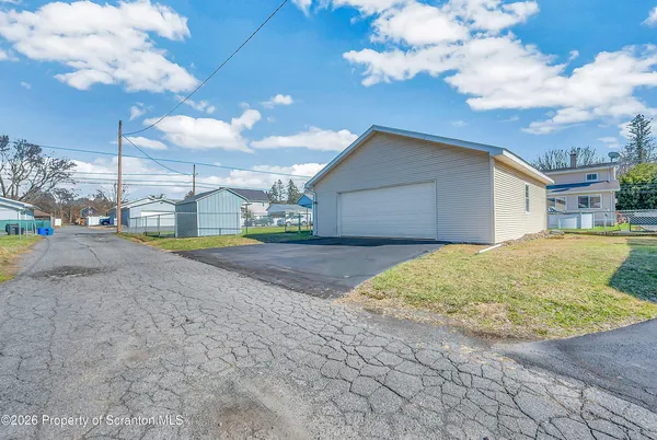 a view of backyard of the house