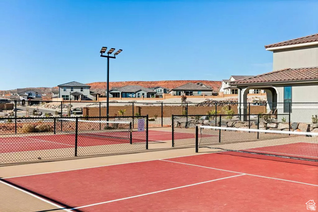 1166 North Riviera Alley Washington, UT 84780 - Photo 25 of 26 View of tennis court featuring a residential view