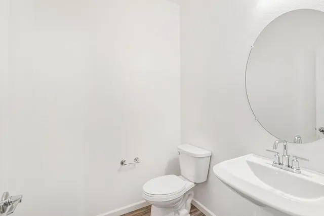 a bathroom with a sink and a toilet