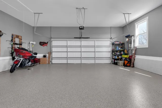 a view of a garage with rack and bicycle