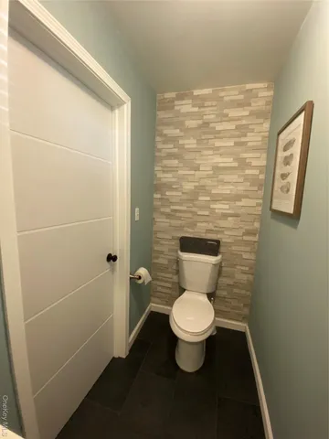 a bathroom with a toilet