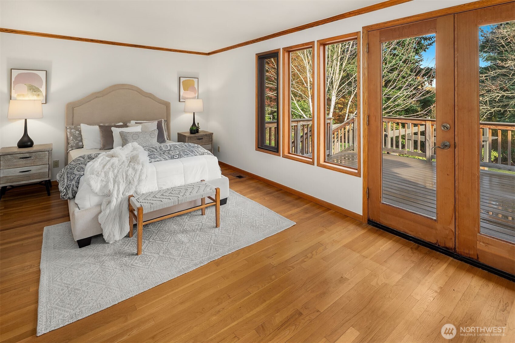 1718 128th Avenue Southeast Bellevue, WA 98005 - Photo 13 of 40 a bedroom with a bed and a large window