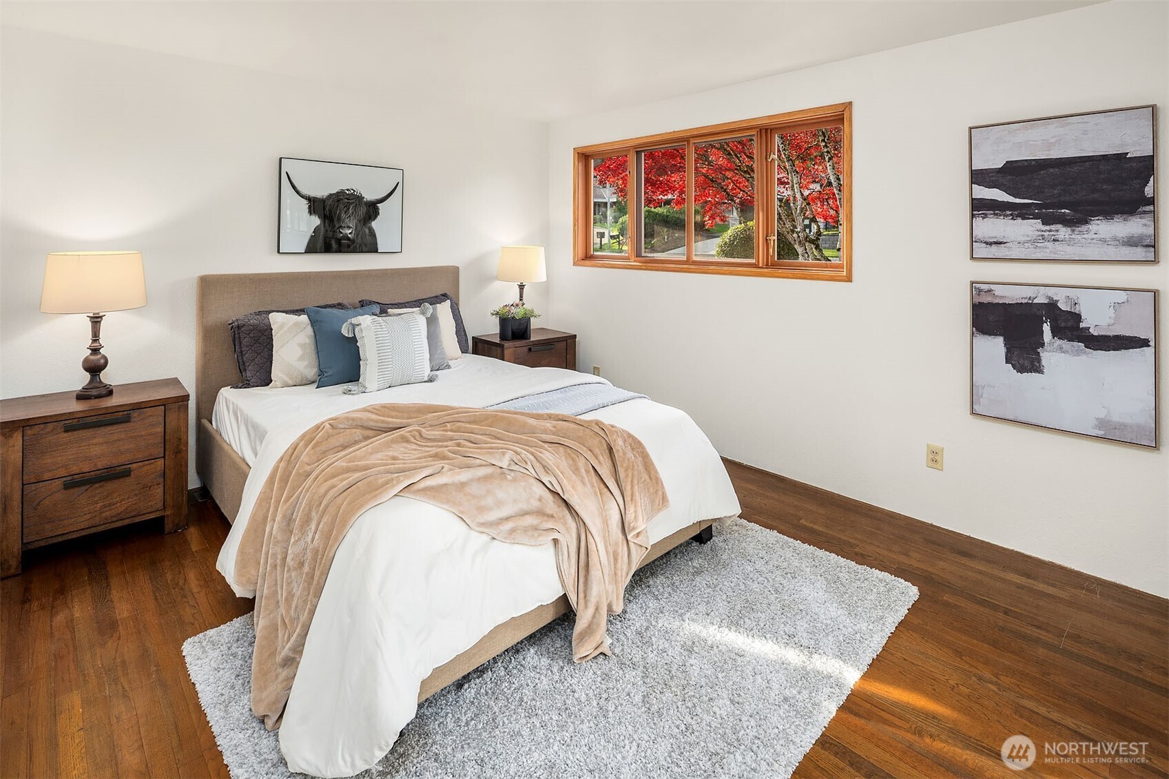 1718 128th Avenue Southeast Bellevue, WA 98005 - Photo 18 of 40 a bedroom with a bed and a night stand