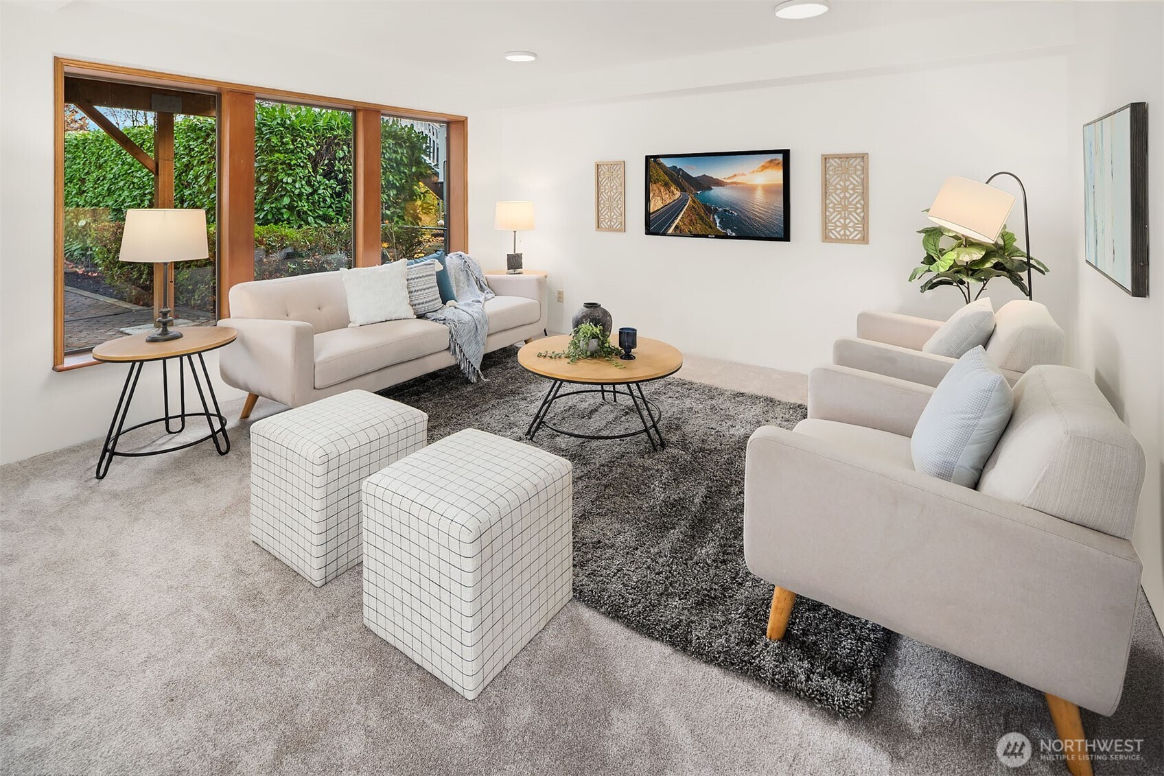 1718 128th Avenue Southeast Bellevue, WA 98005 - Photo 20 of 40 a living room with furniture and a large window