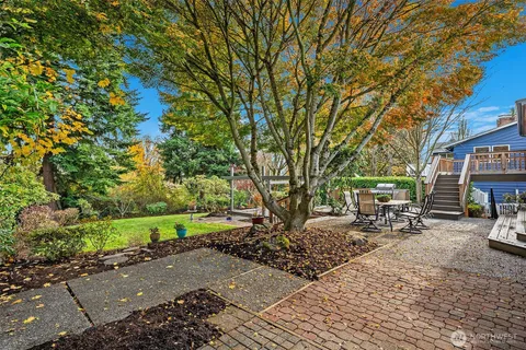 a row of car parked in front of house