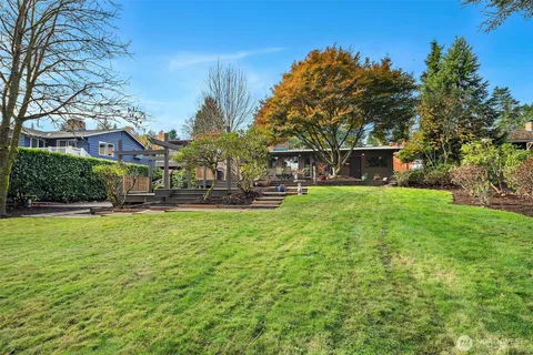 a view of a house with a back yard