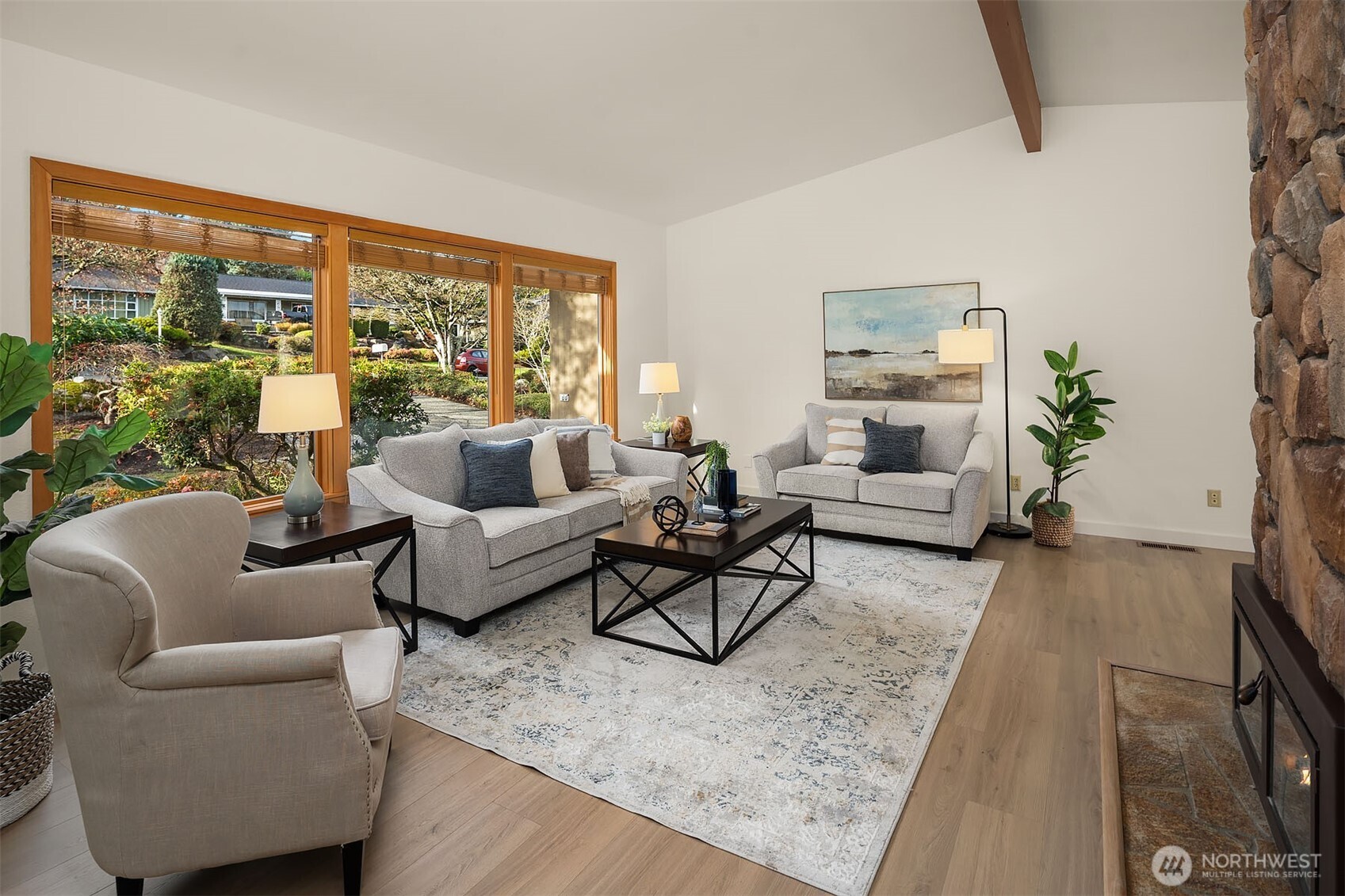 1718 128th Avenue Southeast Bellevue, WA 98005 - Photo 6 of 40 a living room with furniture and a large window