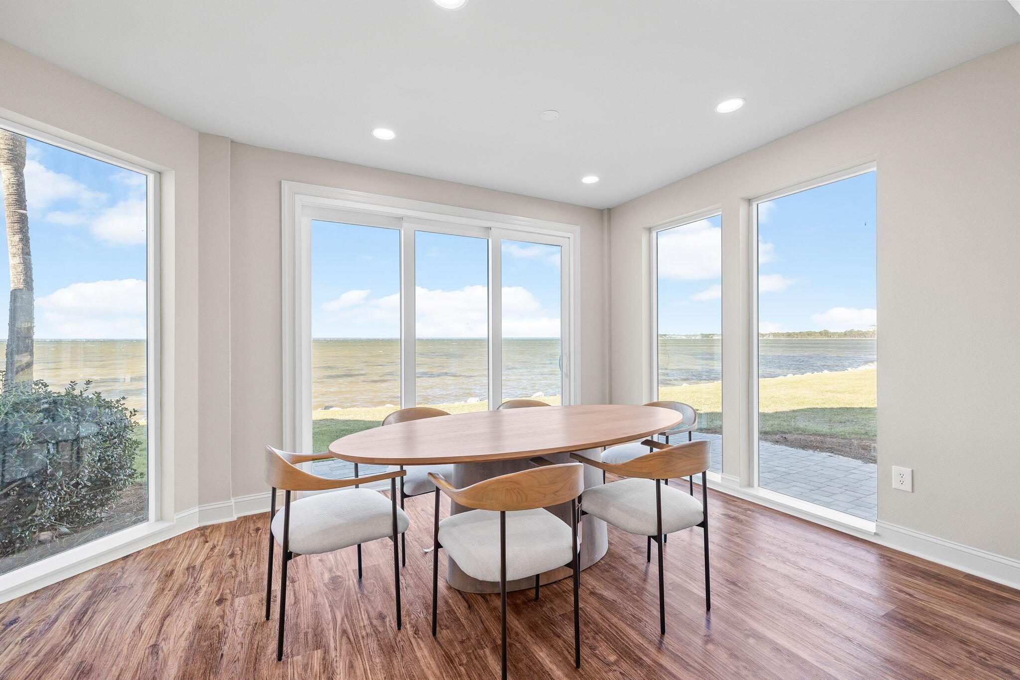 969 Northshore Drive Miramar Beach, FL 32550 - Photo 11 of 87 a view of a dining room with furniture and wooden floor