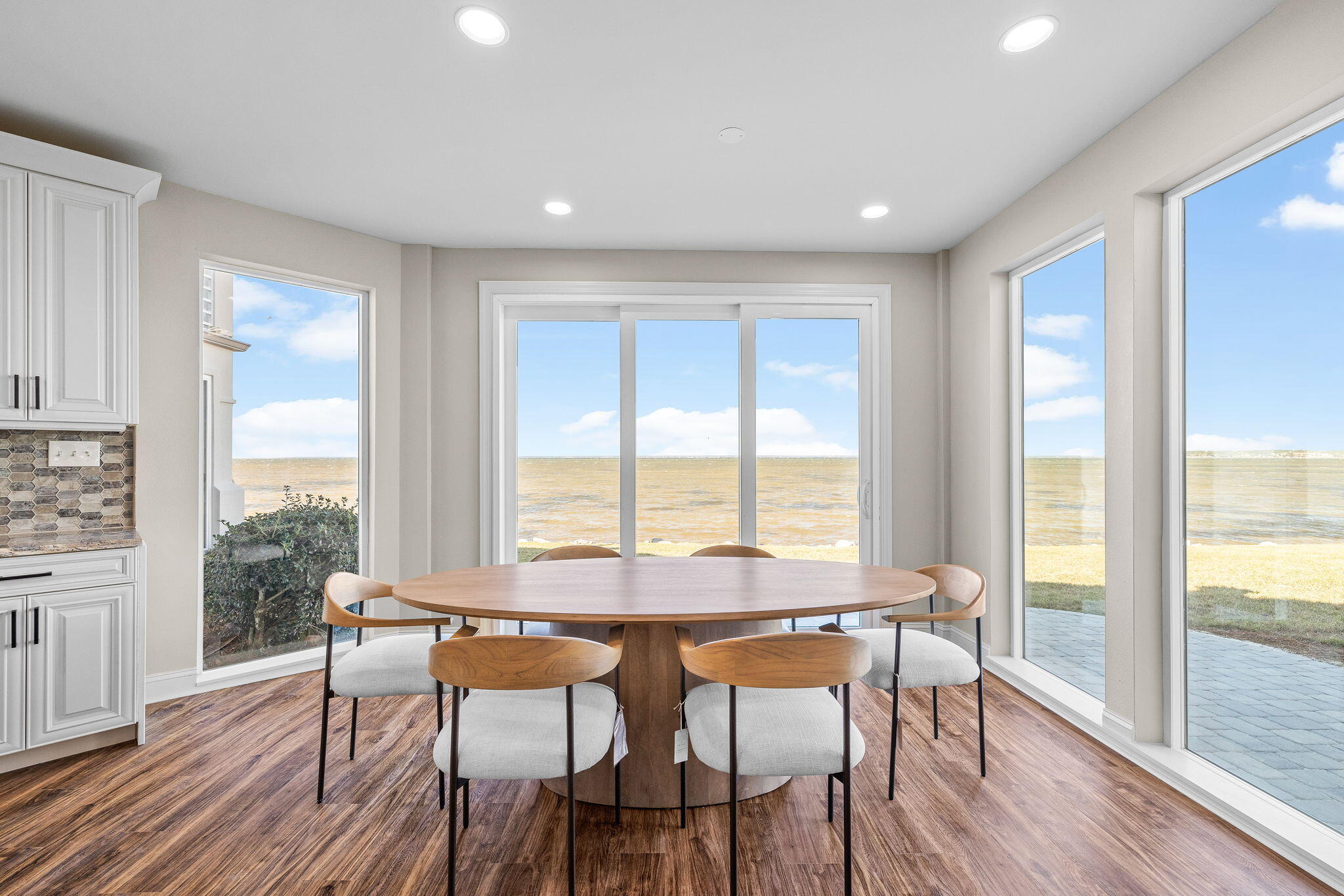 969 Northshore Drive Miramar Beach, FL 32550 - Photo 12 of 87 a view of a dining room with furniture and wooden floor