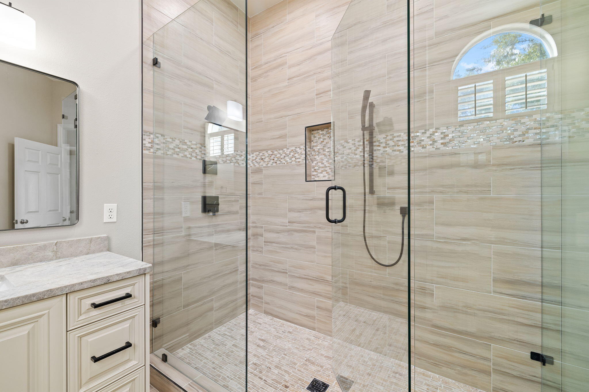 969 Northshore Drive Miramar Beach, FL 32550 - Photo 21 of 87 a bathroom with a shower two mirror and a sink