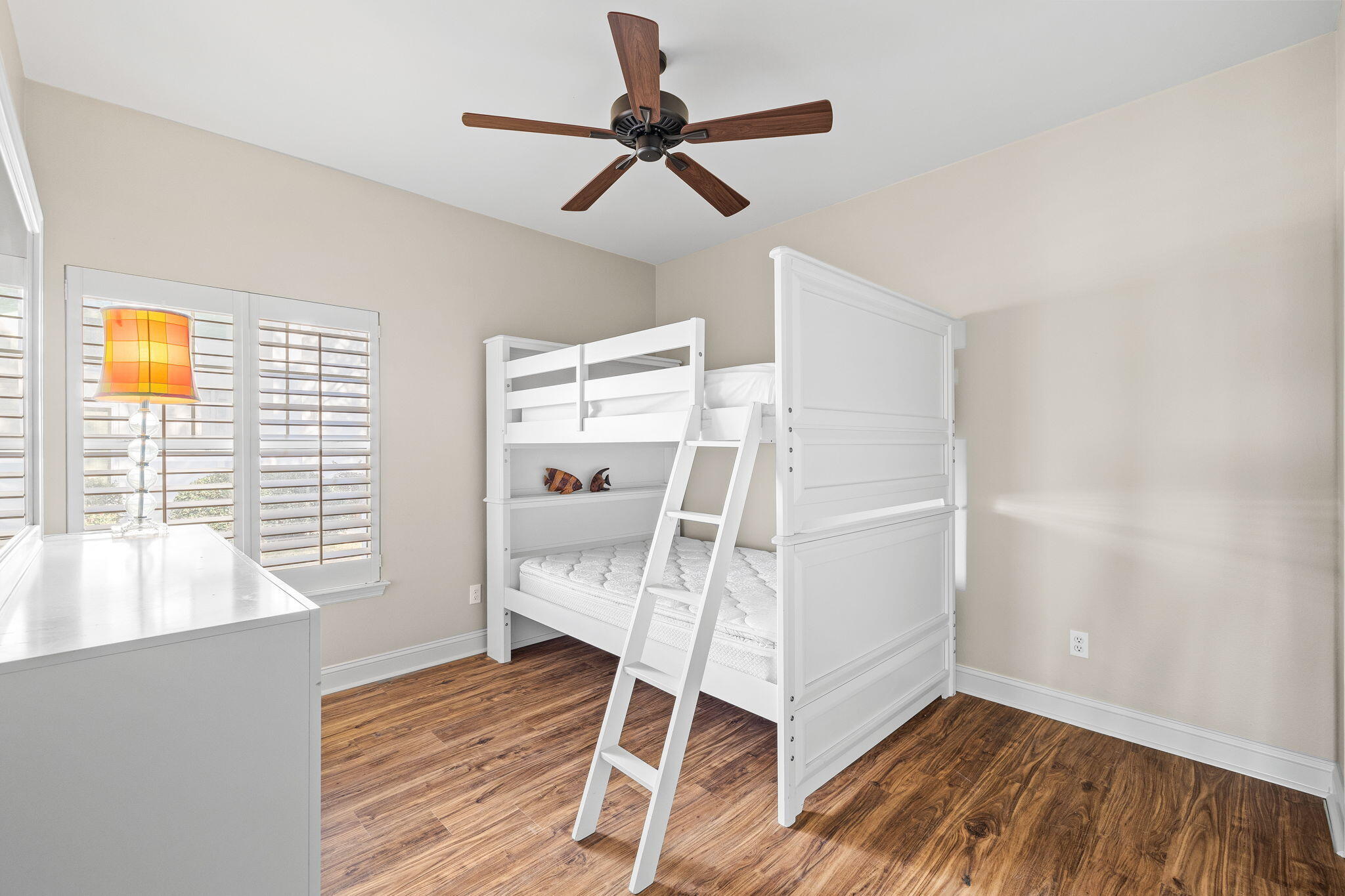 969 Northshore Drive Miramar Beach, FL 32550 - Photo 27 of 87 a view of a livingroom with wooden floor and white walls