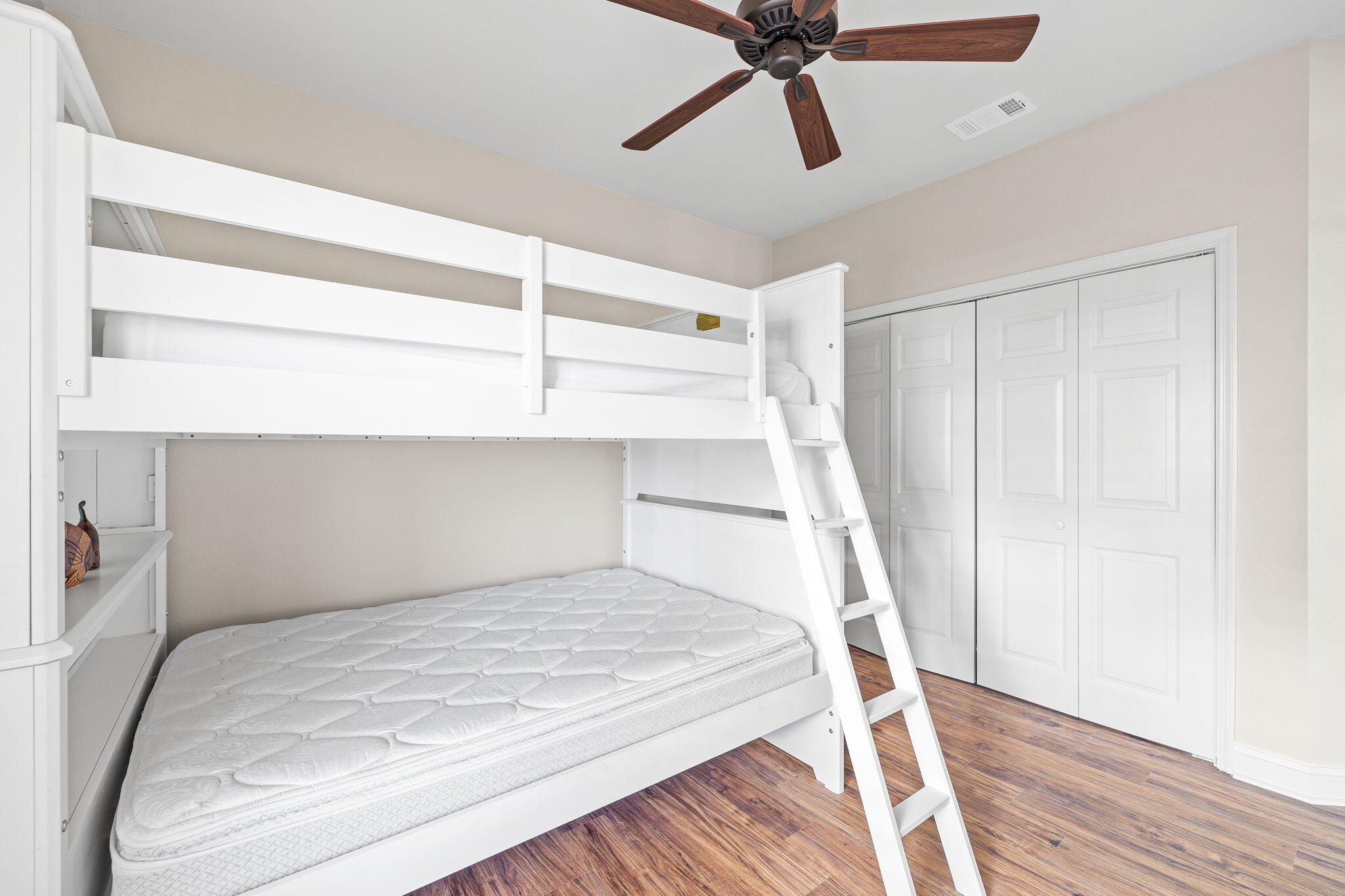 969 Northshore Drive Miramar Beach, FL 32550 - Photo 28 of 87 a bedroom with a bed and a chandelier