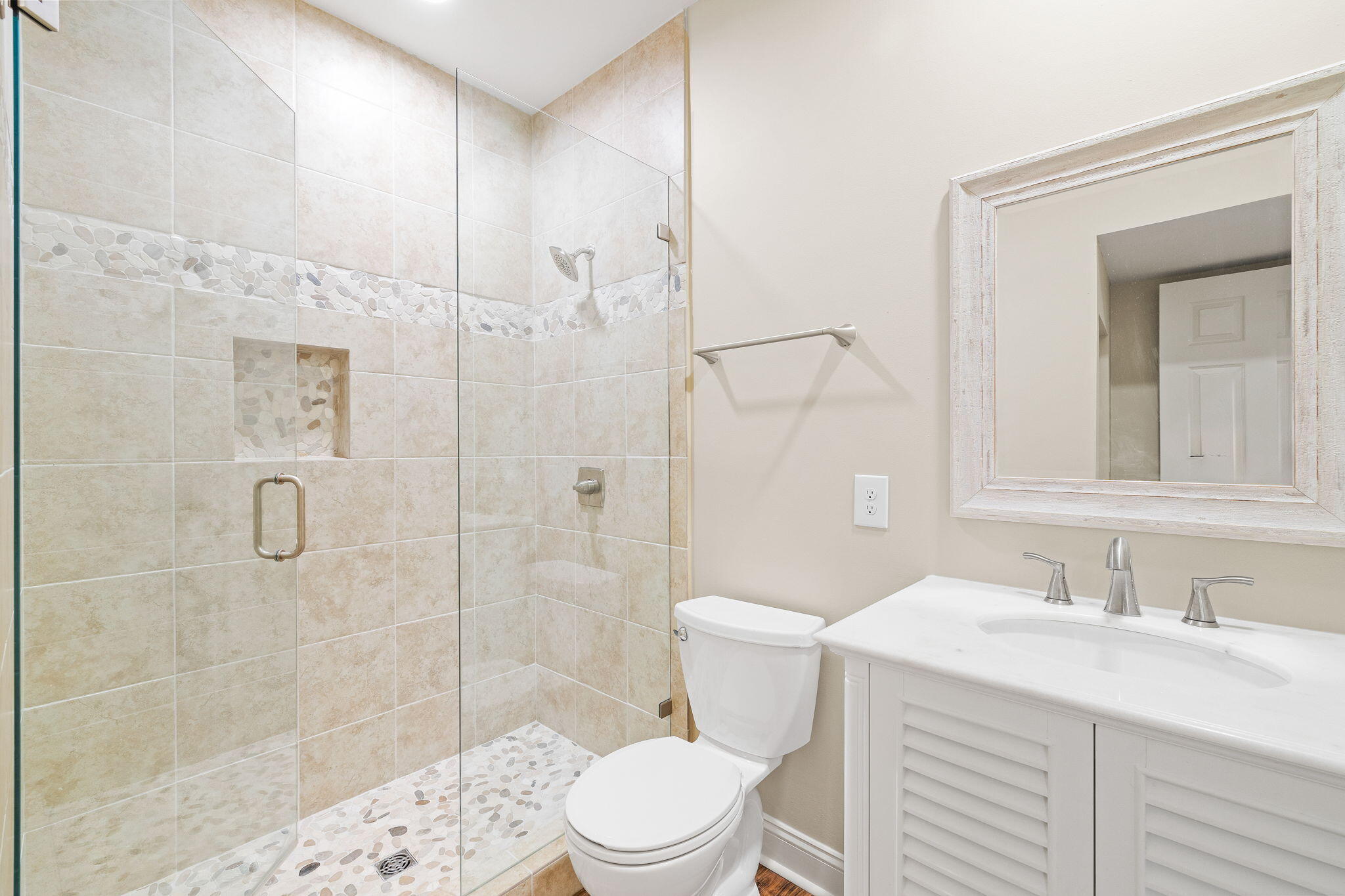 969 Northshore Drive Miramar Beach, FL 32550 - Photo 29 of 87 a bathroom with a sink toilet a mirror and shower