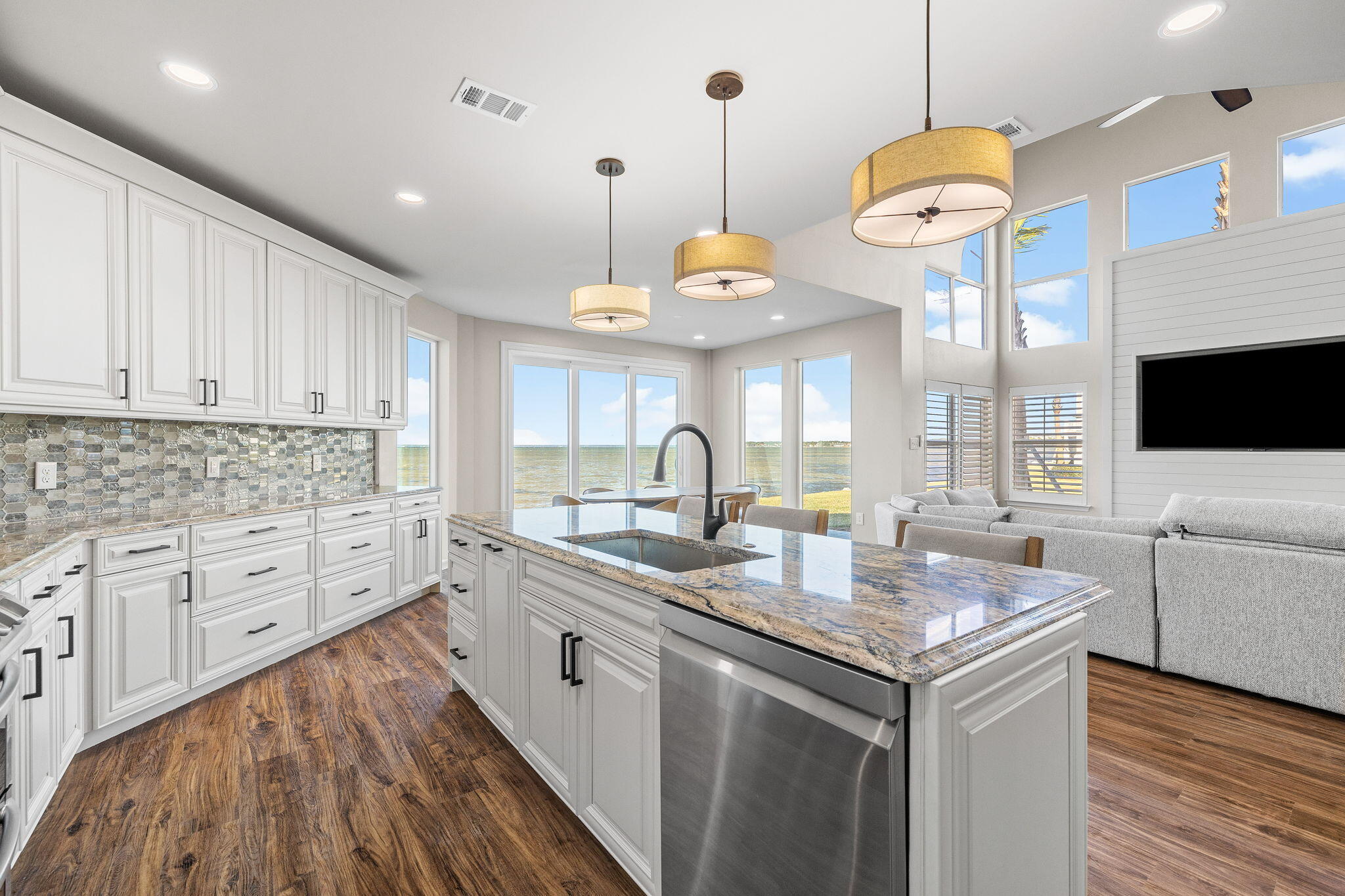969 Northshore Drive Miramar Beach, FL 32550 - Photo 8 of 87 a kitchen with granite countertop a sink a stove and cabinets