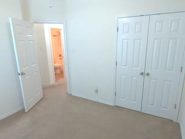 a bathroom with a shower and a bath tub