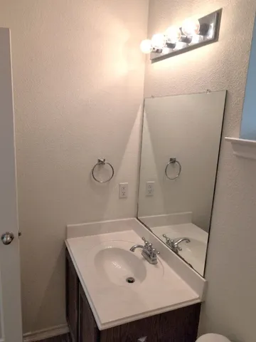 a view of house with yard