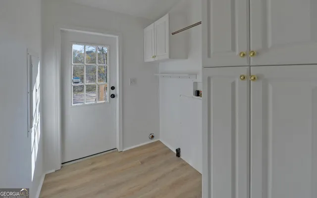 a view of a hallway with closet