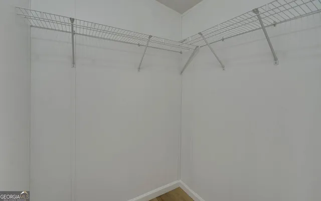 a view of a room with racks on the wall