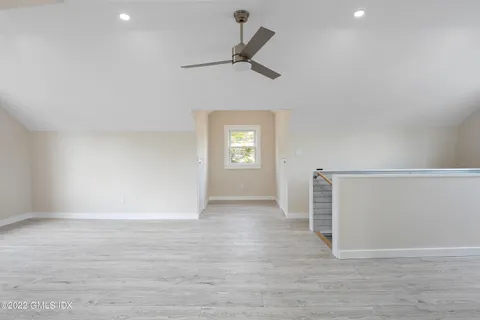 an aerial view of a house with a garden