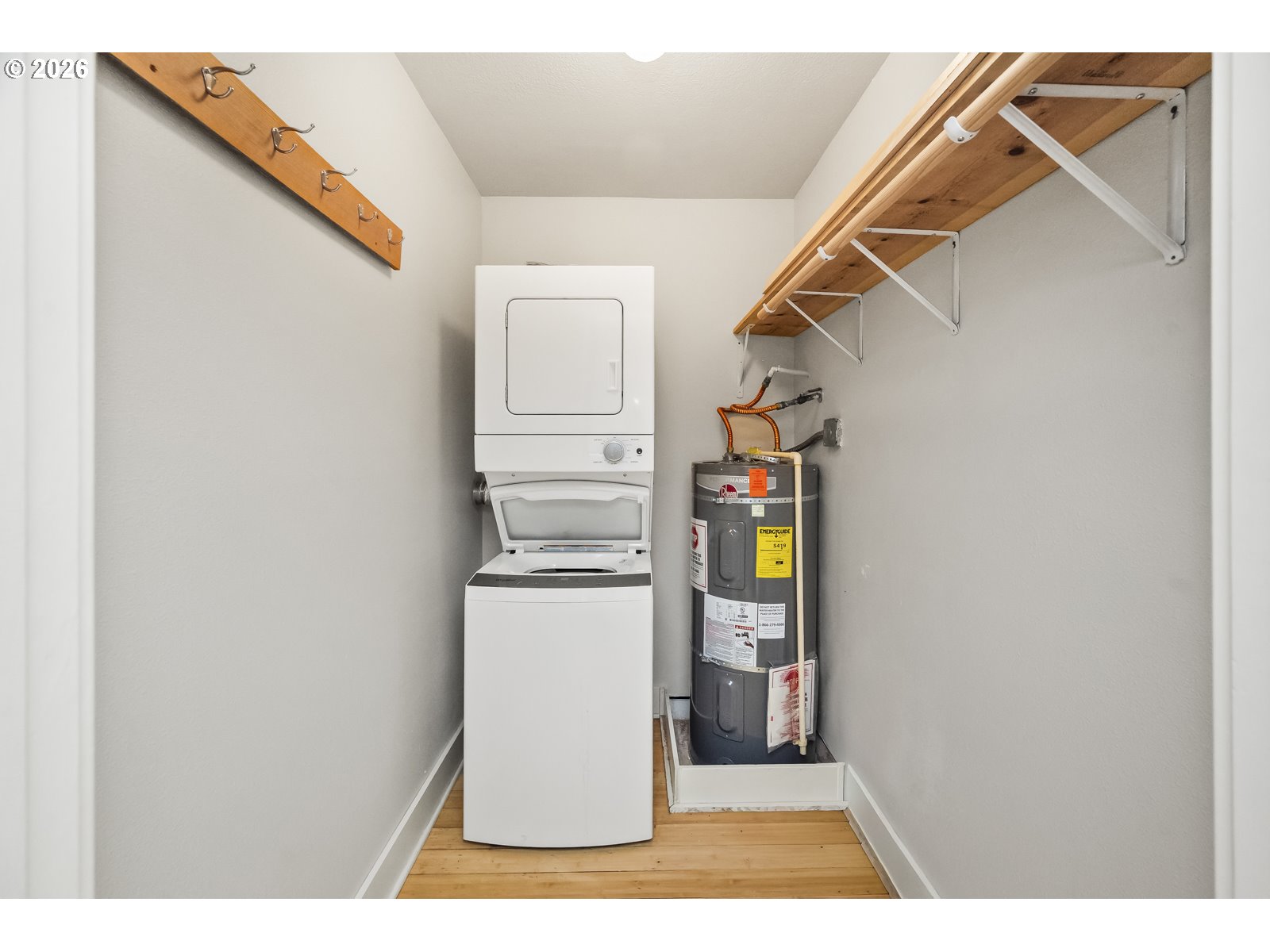2301 Southeast Caruthers Street, Unit 1 Portland, OR 97214 - Photo 15 of 18 a utility room with dryer and washer