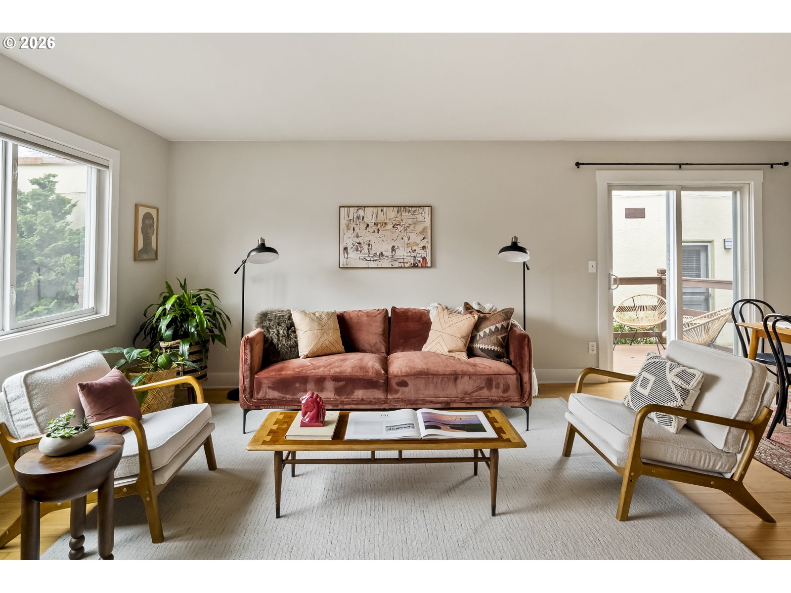 2301 Southeast Caruthers Street, Unit 1 Portland, OR 97214 - Photo 2 of 18 a living room with furniture and a window