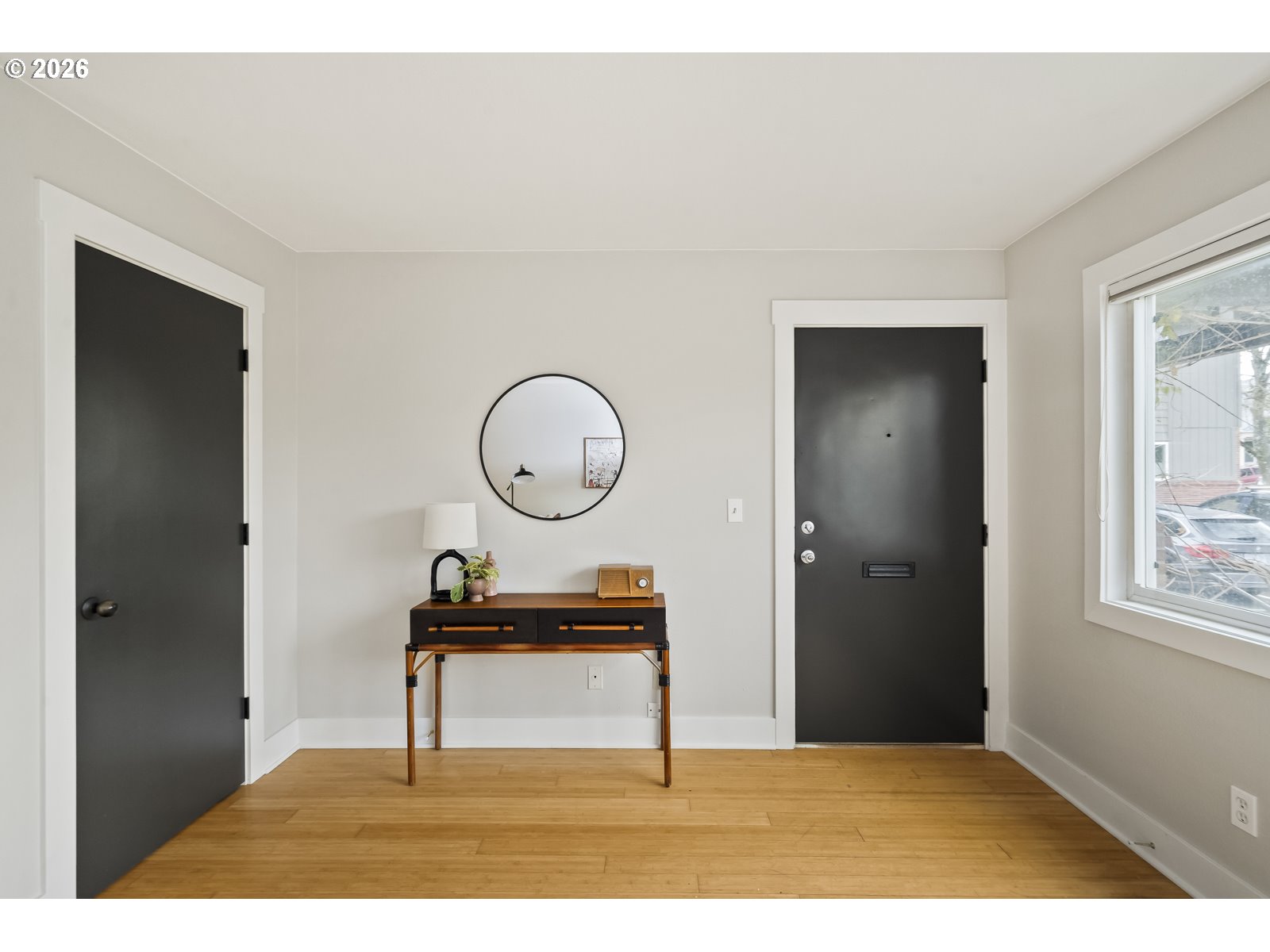 2301 Southeast Caruthers Street, Unit 1 Portland, OR 97214 - Photo 4 of 18 a living room with furniture and a window