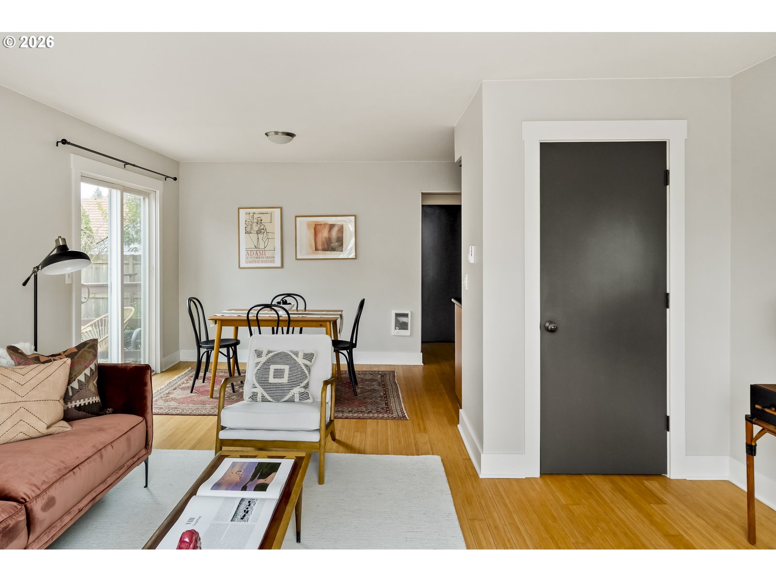 2301 Southeast Caruthers Street, Unit 1 Portland, OR 97214 - Photo 5 of 18 a living room with furniture and a rug