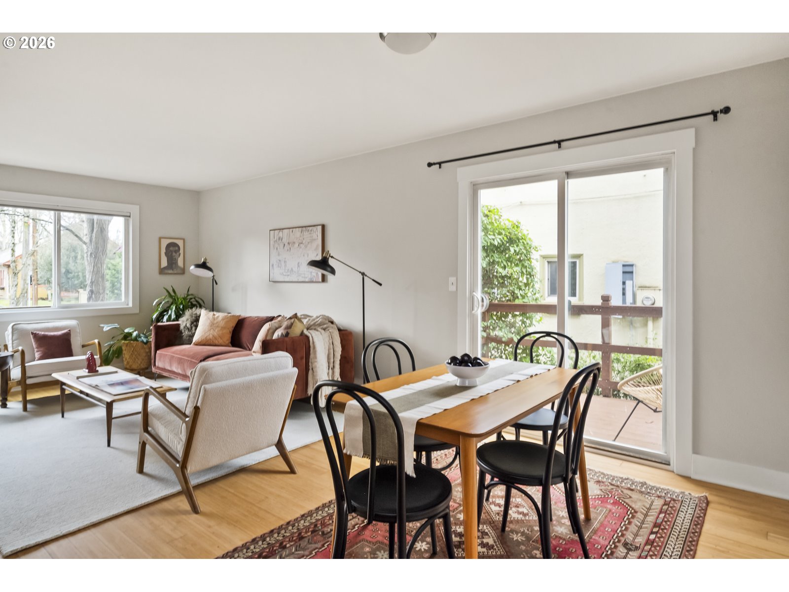 2301 Southeast Caruthers Street, Unit 1 Portland, OR 97214 - Photo 6 of 18 a living room with furniture and a large window
