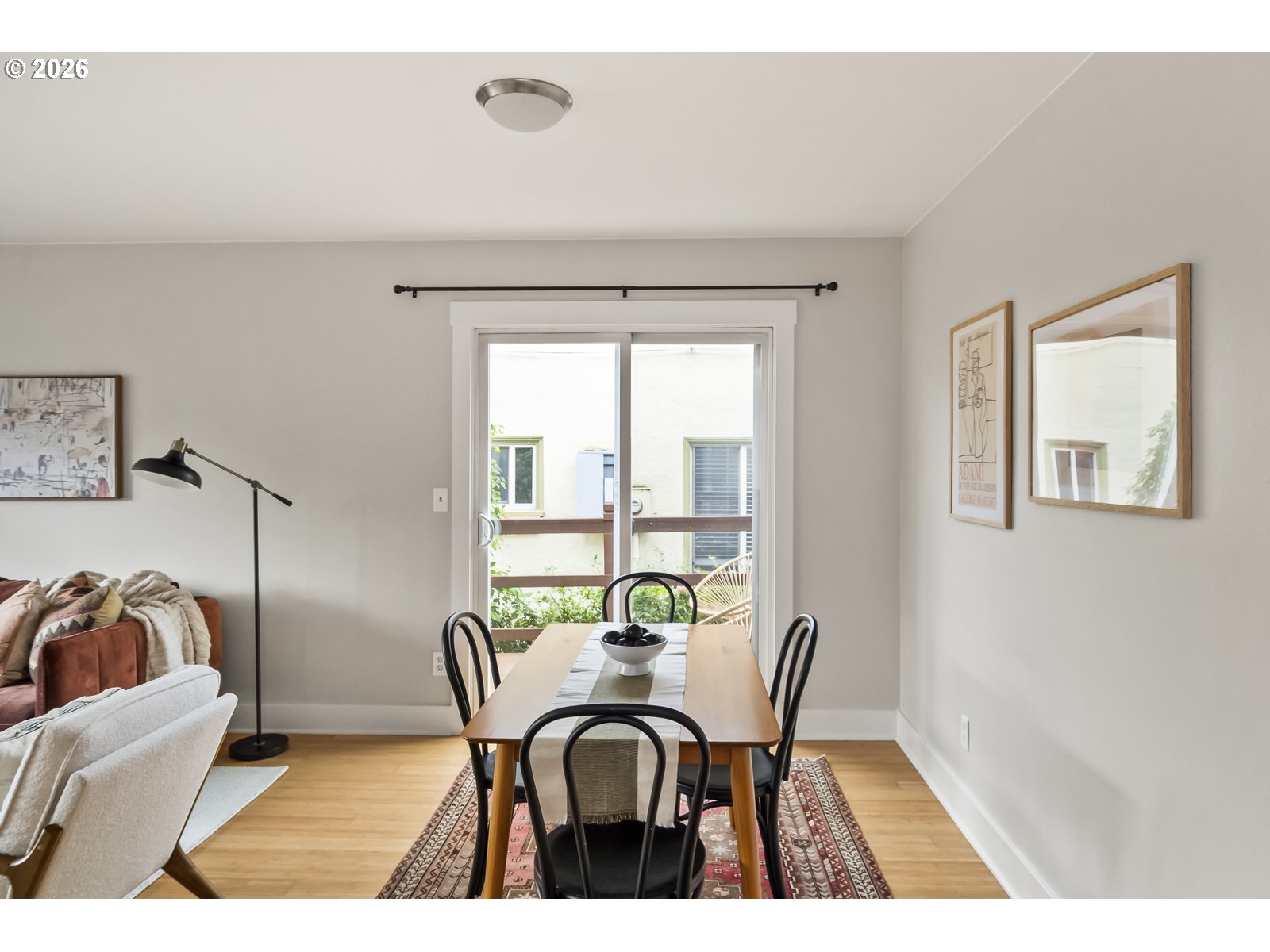 2301 Southeast Caruthers Street, Unit 1 Portland, OR 97214 - Photo 10 of 18 a view of a dining room with furniture window and outside view