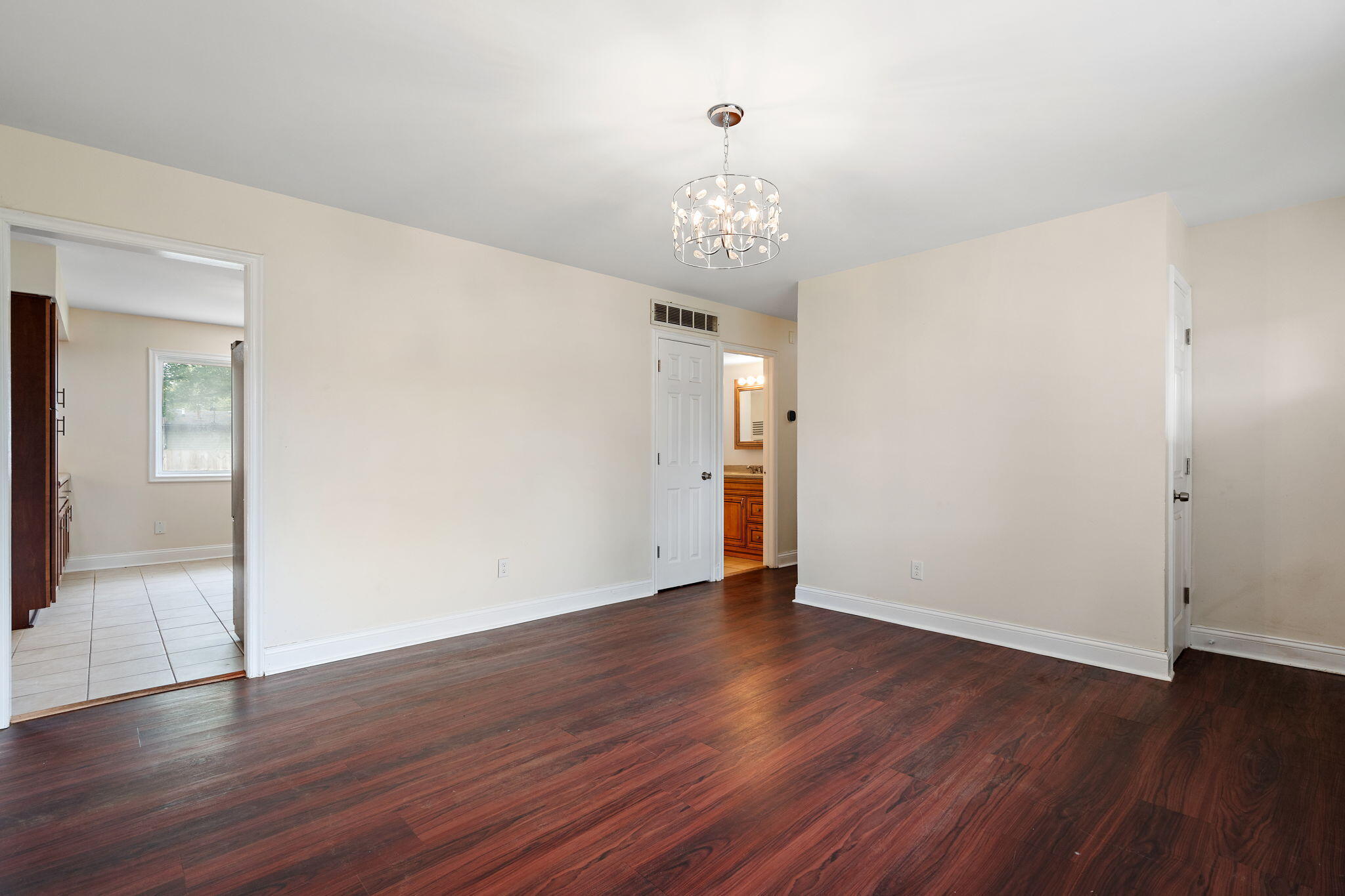 385 Riviera Court Valparaiso, IN 46385 - Photo 14 of 27 a view of an empty room with wooden floor