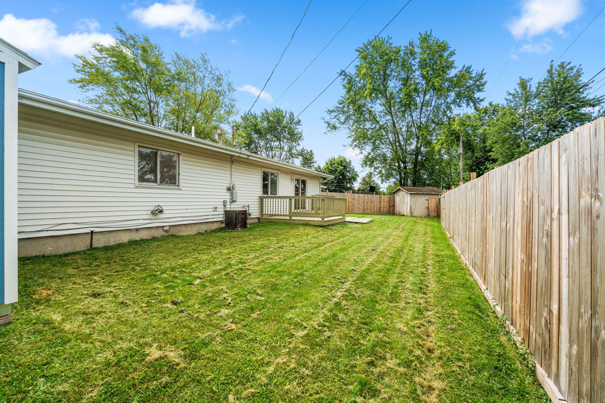 385 Riviera Court Valparaiso, IN 46385 - Photo 24 of 27 a view of a backyard with a garden