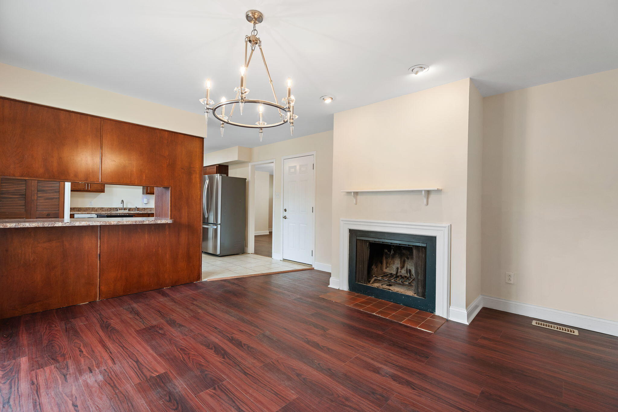 385 Riviera Court Valparaiso, IN 46385 - Photo 8 of 27 a view of kitchen with cabinets and wooden floor