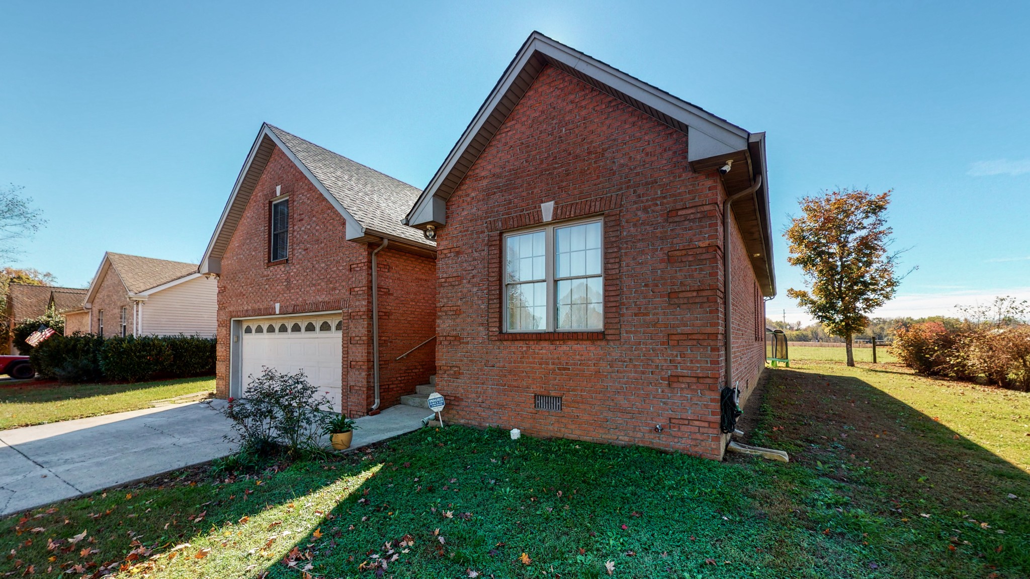 184 Foxrun Springfield, TN 37172 - Photo 1 of 20 a front view of a house with garden