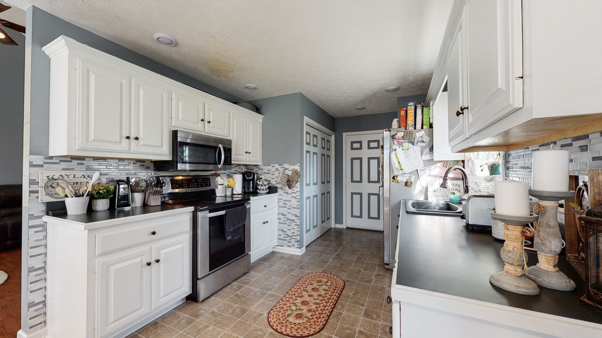 184 Foxrun Springfield, TN 37172 - Photo 11 of 20 a kitchen with stainless steel appliances lots of counter top space cabinets and furniture