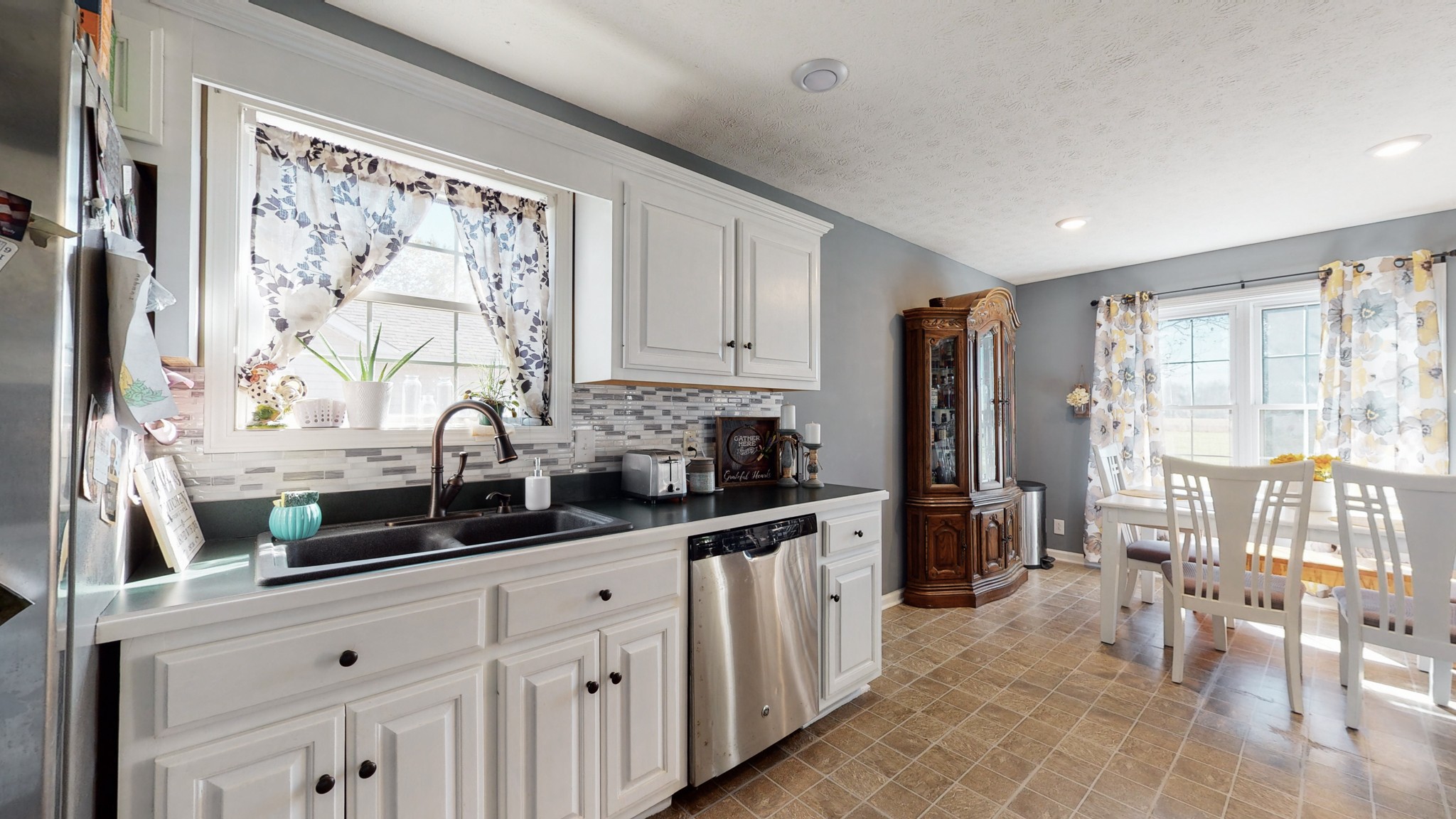 184 Foxrun Springfield, TN 37172 - Photo 13 of 20 a kitchen with stainless steel appliances a sink stove and cabinets