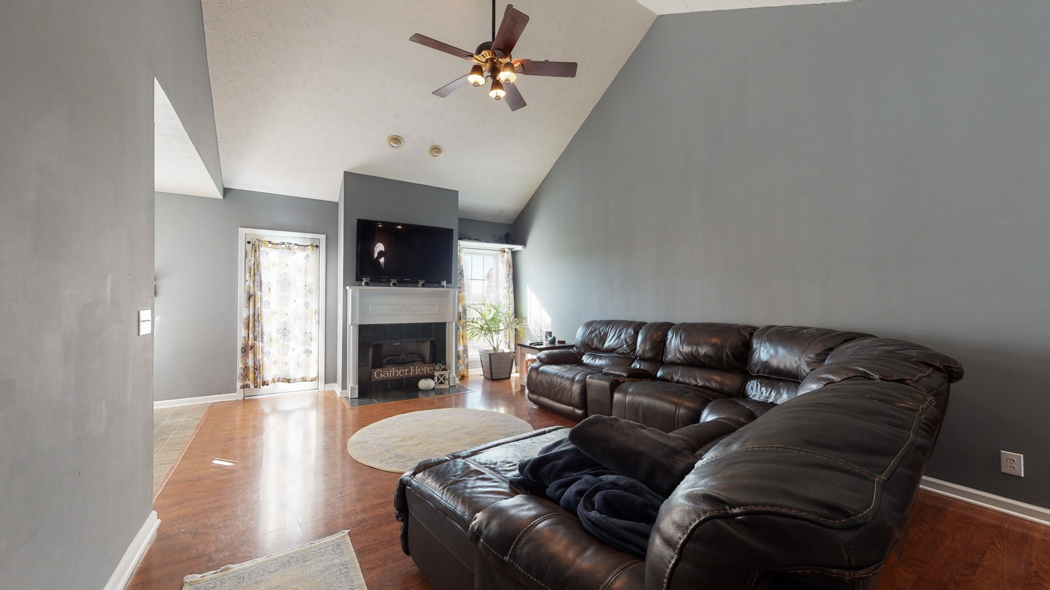 184 Foxrun Springfield, TN 37172 - Photo 5 of 20 a living room with furniture and a fireplace