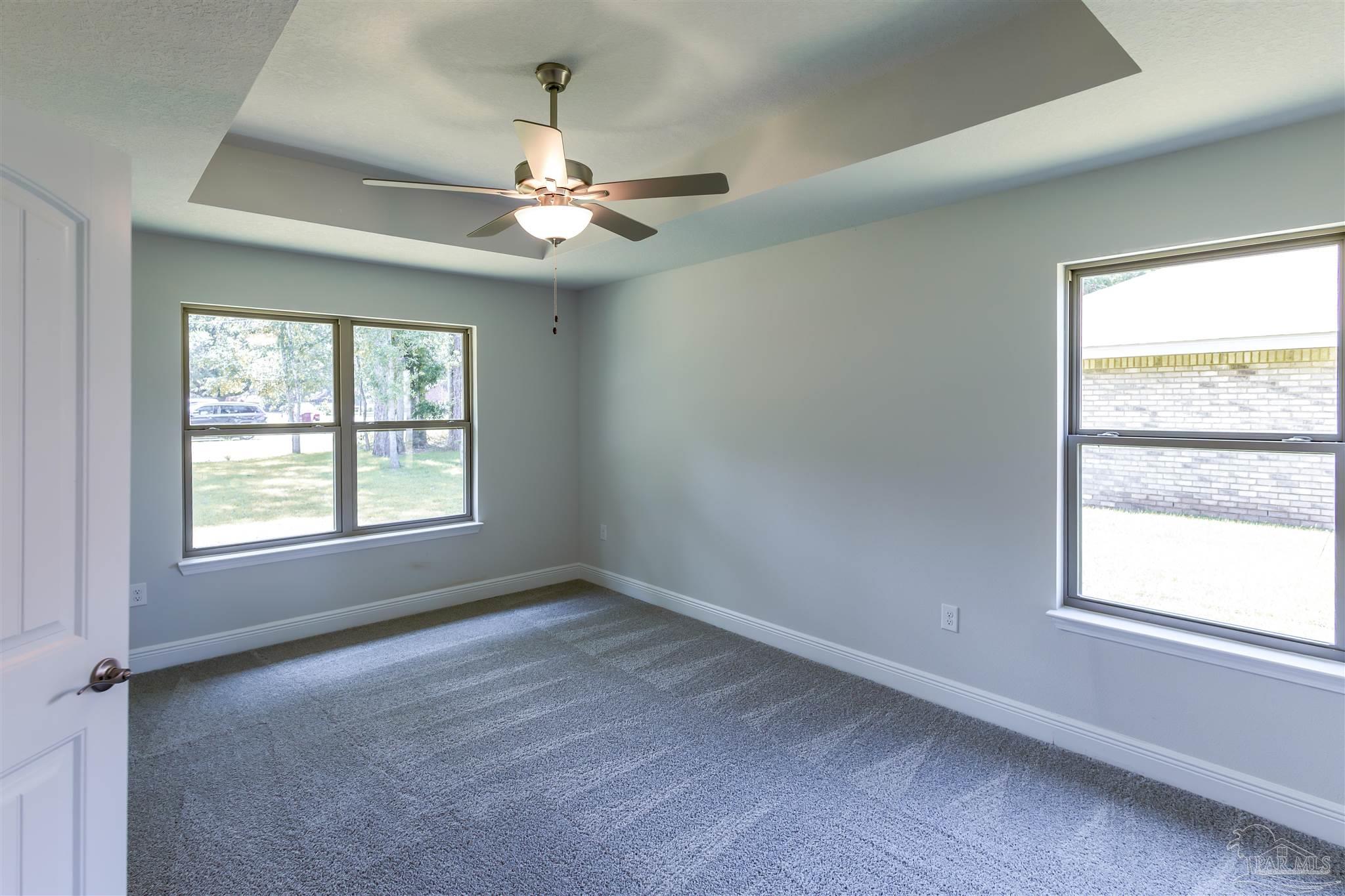 5979 Parsonage Circle Milton, FL 32570 - Photo 18 of 26 a view of an empty room with a window