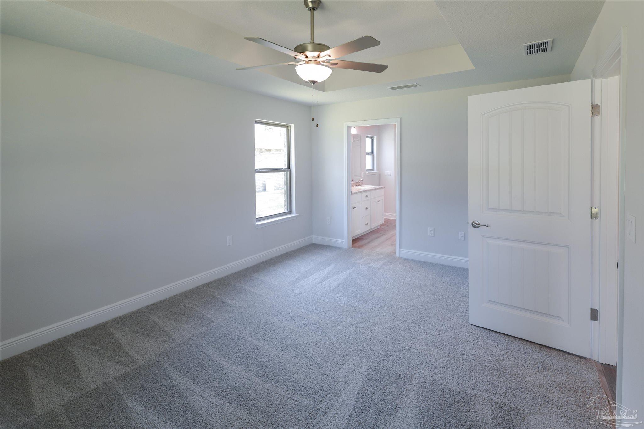 5979 Parsonage Circle Milton, FL 32570 - Photo 19 of 26 a view of an empty room with a window