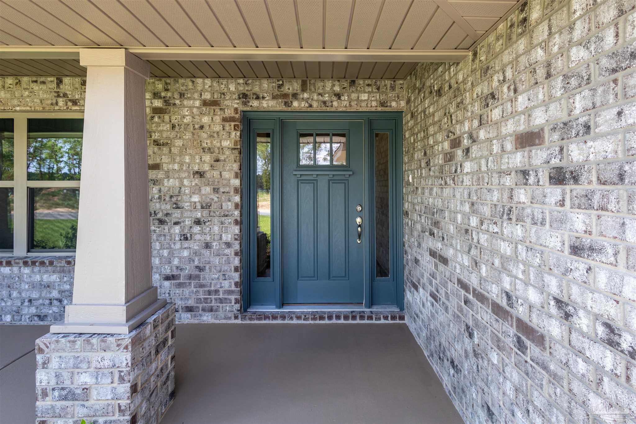 5979 Parsonage Circle Milton, FL 32570 - Photo 2 of 26 a view of entryway with a front door