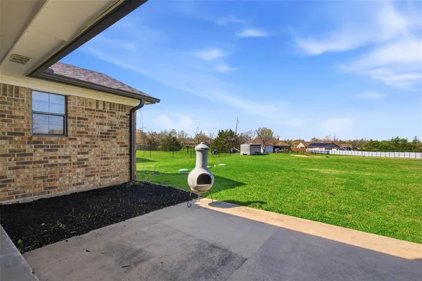 a house view with a garden space