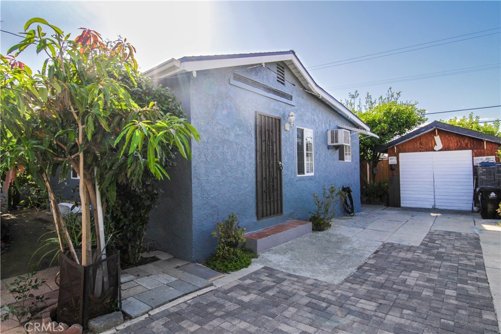 5226 Range View Avenue Los Angeles, CA 90042 - Photo 4 of 16 a front view of a house with garden