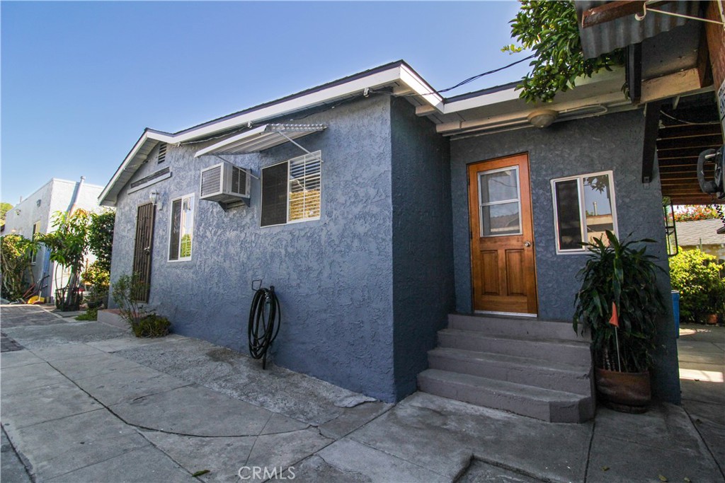 5226 Range View Avenue Los Angeles, CA 90042 - Photo 5 of 16 a front view of a house with garden