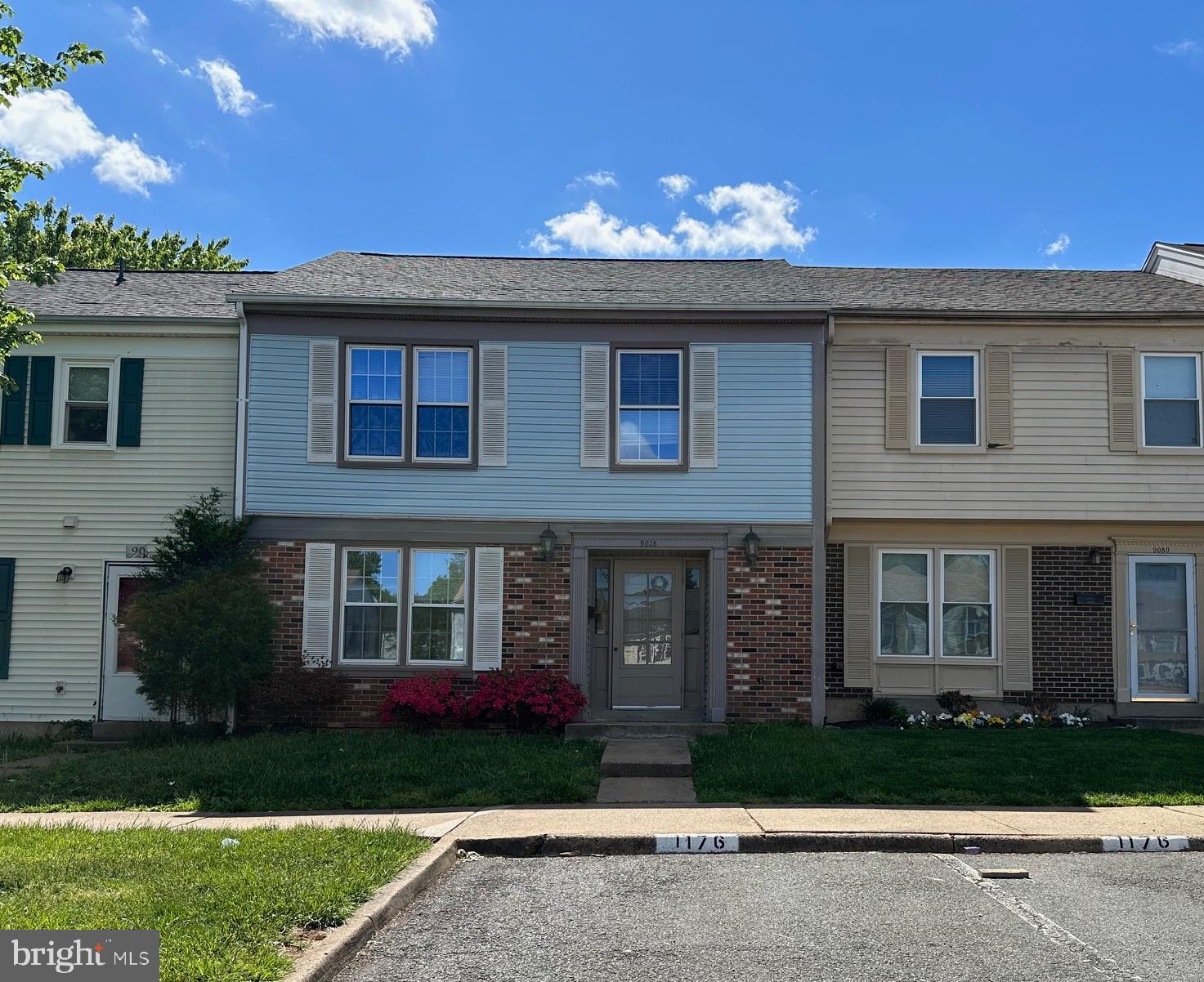 9078 McClellan Common Manassas, VA 20110 - Photo 2 of 25 front view of house with a yard