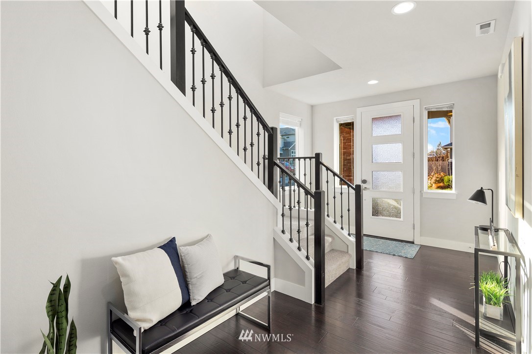 7 176th Place Southeast Bothell, WA 98012 - Photo 11 of 40 a view of entryway and hall with wooden floor